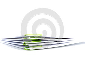 Pile of blank document with paper clip on white