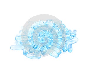 Pile of blue softgel pills isolated