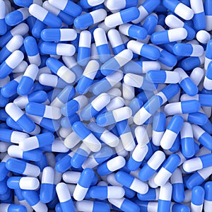 Pile of blue white pills capsules