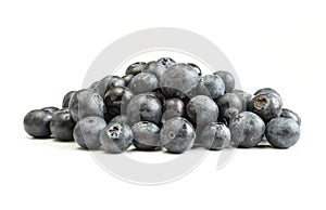 Pile of blueberries isolated on white abckground. Delicious wild berries