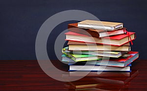 Pile of books on the desk