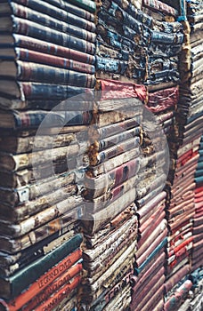 Pile of books volumes inside the bookstore Libreria Acqua Alta in Venice photo