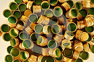 Pile of bottle metal caps as pattern background