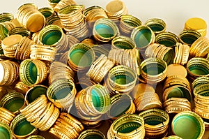 Pile of bottle metal screw caps as pattern background