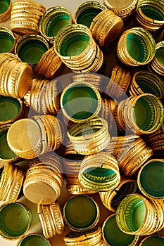 Pile of bottle metal caps as pattern background,