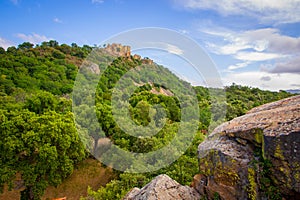 A pile of boulders, covered with lichen in the mountains of Sicily