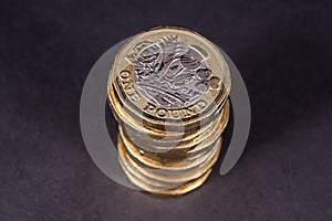 Pile of British One Pound Coins