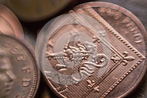 Pile of British two Pence coins