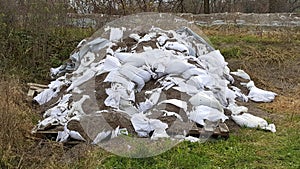 Pile of broken sandbags used for flood protection