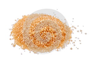 Pile of brown cane sugar isolated on white