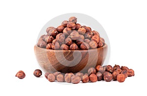 Pile of brown chickpeas in wooden bowl, isolated on white background. Brown chickpea. Garbanzo, bengal gram or chick pea