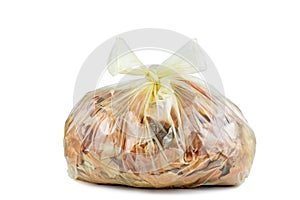 Pile of brown onionskin in the packet photo