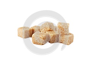 Pile of brown sugar cubes isolated on white