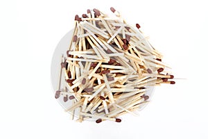 Pile of brown wooden matchsticks