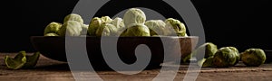 Pile of Brussels sprout in bowl on table