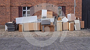 Pile of bulky waste with furniture on the side of the road