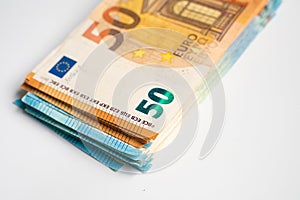 Pile bundle of euro bills money note on white background