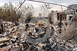 Pile of burnt bricks from a destroyed house after the fire