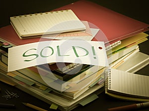 The Pile of Business Documents; Sold