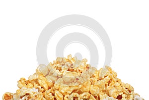 Pile of buttery popcorn isolated photo