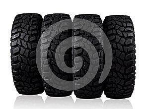 Pile of car tyres isolated on background