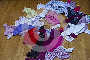 Pile of carelessly scattered clothes.