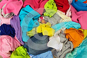 Pile of carelessly scattered clothes. photo