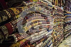 A Pile of Carpets in turkish Carpet Shop