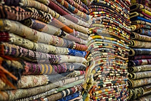 A Pile of Carpets in turkish Carpet Shop