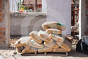 Pile of Cement in bags for construction at construction site