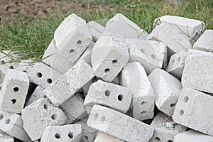 Pile of cement bricks have 2 hole
