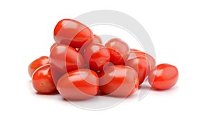 Pile of cherry tomatoes isolated on white