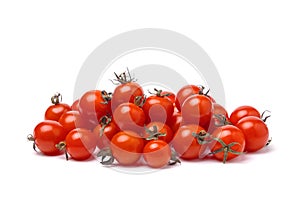 Pile of cherry tomatoes on white background close up