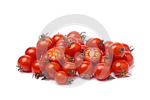 Pile of cherry tomatoes on white background close up