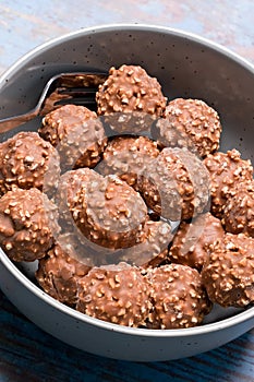 Chocolate nut clusters in a bowl