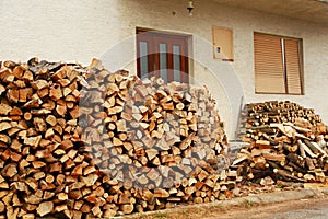 Pile of chopped fire wood prepared for winter
