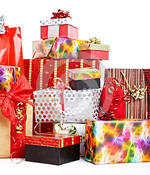 A pile of Christmas gifts in colorful wrapping