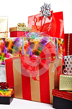 A pile of Christmas gifts in colorful wrapping
