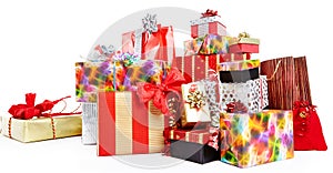 A pile of Christmas gifts in colorful wrapping photo