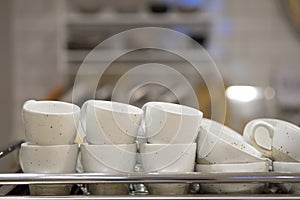 Pile of clean ceramic coffee cups