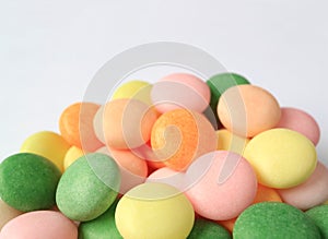 Pile of Closed Up Multi-Colored Round Candies with Selective Focus