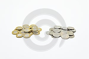 A pile of coins, the Polish currency 1 and 2 PLN / Polish zloty. Isolated on white background with clipping path.