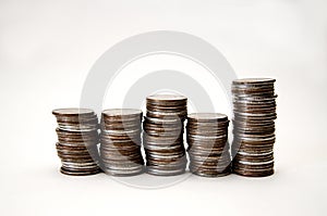 Pile of coins on a white background