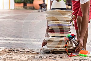 Pile of colombian hats on the street in Cartagena, Colombia.