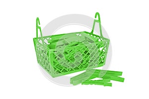 Pile of color plastic cloth clamps inside basket isolated on white background.