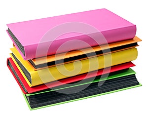 The pile of colored photo albums on wite backround