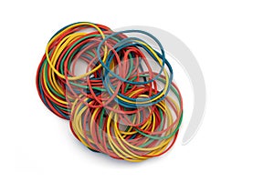 pile of colored rubber bands isolated on white, stationery