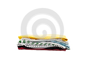 Pile of colorful clothes and Beautiful summer isolated on white