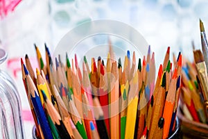 A pile of colorful colored pencils close-up