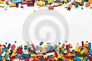 A pile of colorful Lego blocks scattered all over the place.